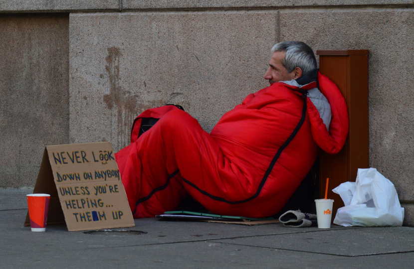 Homeless man in sleeping bag