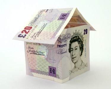 British money shaped into a house